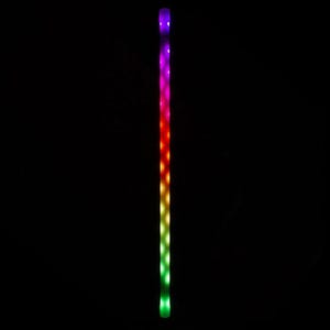 May include: A long, cylindrical LED light wand featuring a vertical gradient of illuminated colors. The light transitions from a deep purple at the top, through shades of red and orange in the center, down to a bright green at the bottom end.