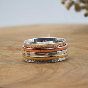 Bague de vœux "Vita" avec trois anneaux rotatifs