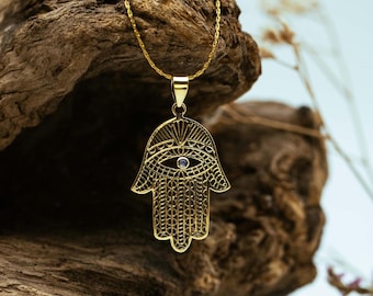Golden pendant "Hand of Fatima" with moonstone