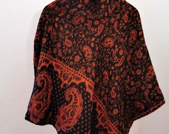 Winter poncho “ZORA” with paisley pattern | Warm poncho in rust red/black