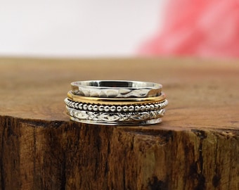 Wensring “XENIA” met drie draaiende ringen | Draaiende ring van 925 sterling zilver met accenten van koper, zilver en messing.