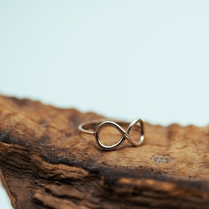 silver ring with infinity sign