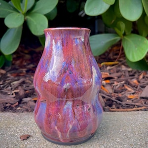 May include: A rustic wooden sign with the text "Welcome to our home" in a handwritten style. The sign features a distressed finish and a simple, inviting design, perfect for a front porch or entryway.