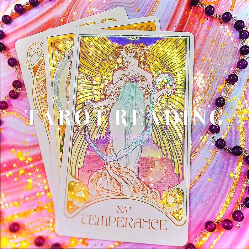 May include: A tarot card reading with the Temperance card face up. The card features a woman pouring water from one cup to another, symbolizing balance and harmony. The card is surrounded by a sparkly background and a purple beaded necklace.