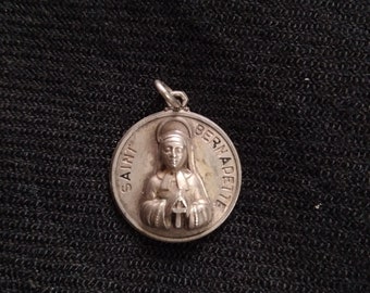 Creed sterling patron Saint Bernadette pendant