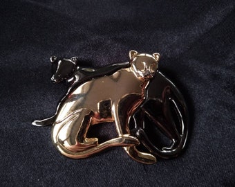 Liz Claiborne black and gold panther brooch