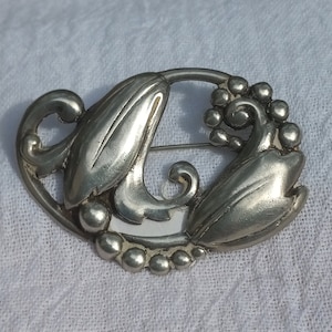 Broche con diseño de flor de lirio de los valles estilo art déco de plata de ley vintage
