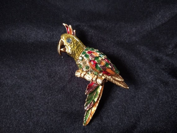 Gold tone enamel parrot brooch