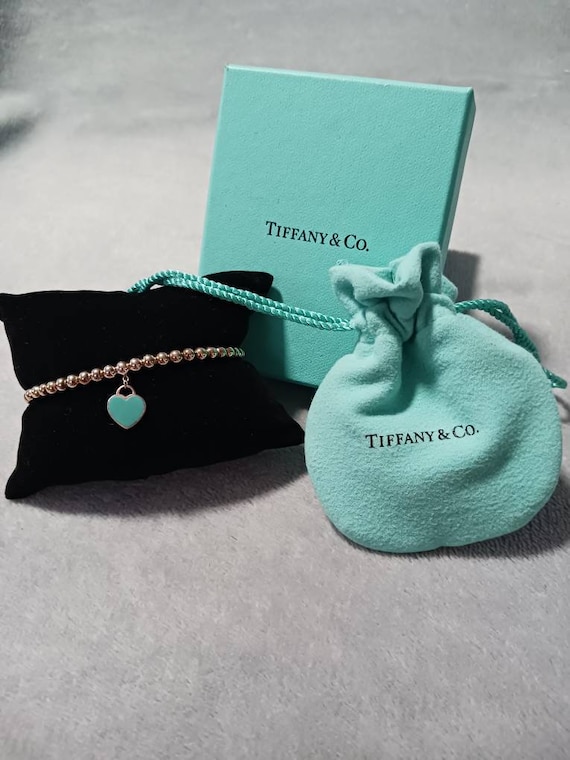 Buy the 925 Tiffany & Co. Blue Enamel Heart Tag Ball Bead Bracelet W/ Pouch  | GoodwillFinds