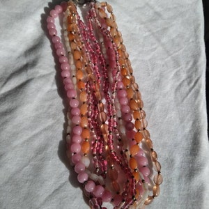 Five strand pink beaded necklace