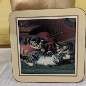 Cat coasters in original box.