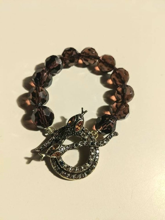 Heidi Daus brown beaded snake bracelet - image 1