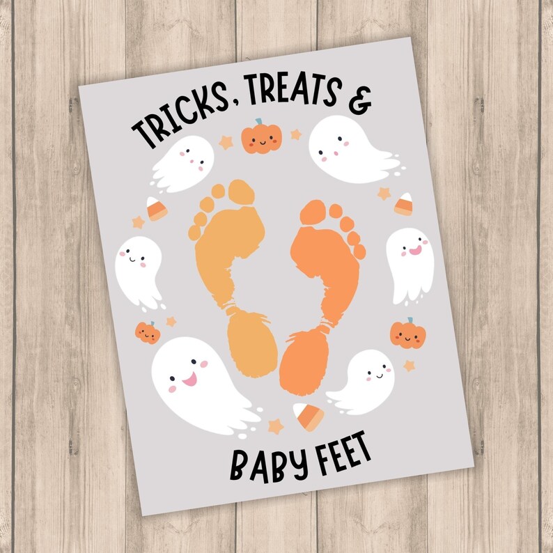 May include: A grey printable sign with the text "TRICKS, TREATS & BABY FEET" in black. The sign features a heart shape made of orange footprints, surrounded by ghosts and pumpkins.