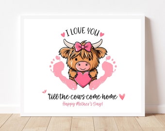 May include: A pink and brown Highland cow cartoon holding a pink heart with pink footprints around it. The text reads "I love you till the cows come home Happy Mother's Day!"