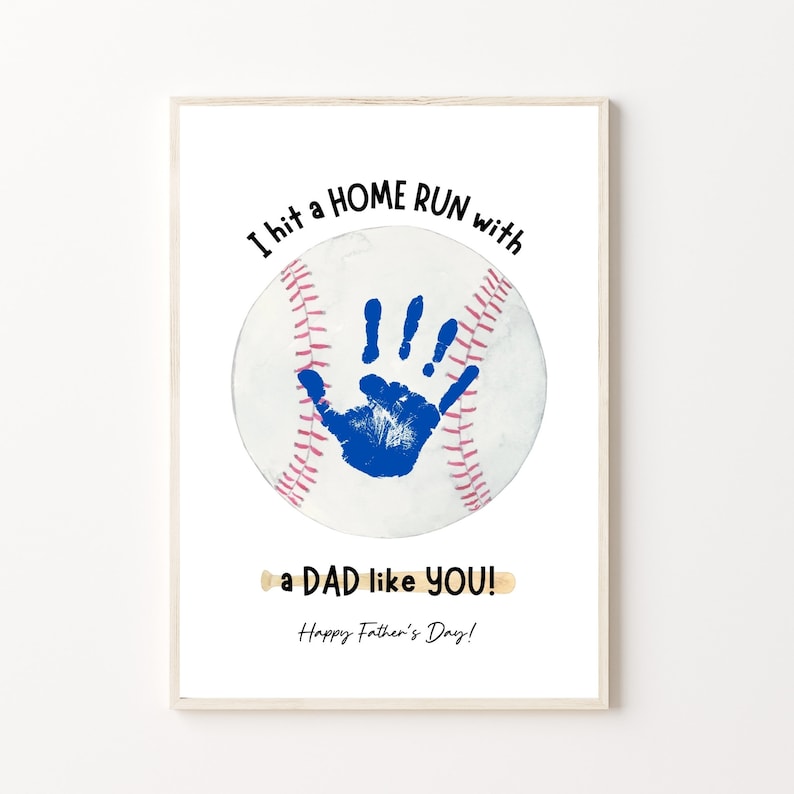 Printable Baseball Father's Day handprint craft for one or two handprints. Has a baseball and bat and says I hit a home run with a dad like you. A great gift for dad from kids, baby or toddler.