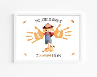 May include: A printable handprint art craft for kids featuring a cute scarecrow with a pumpkin patch. The text reads "This little scarecrow is thankful for you".