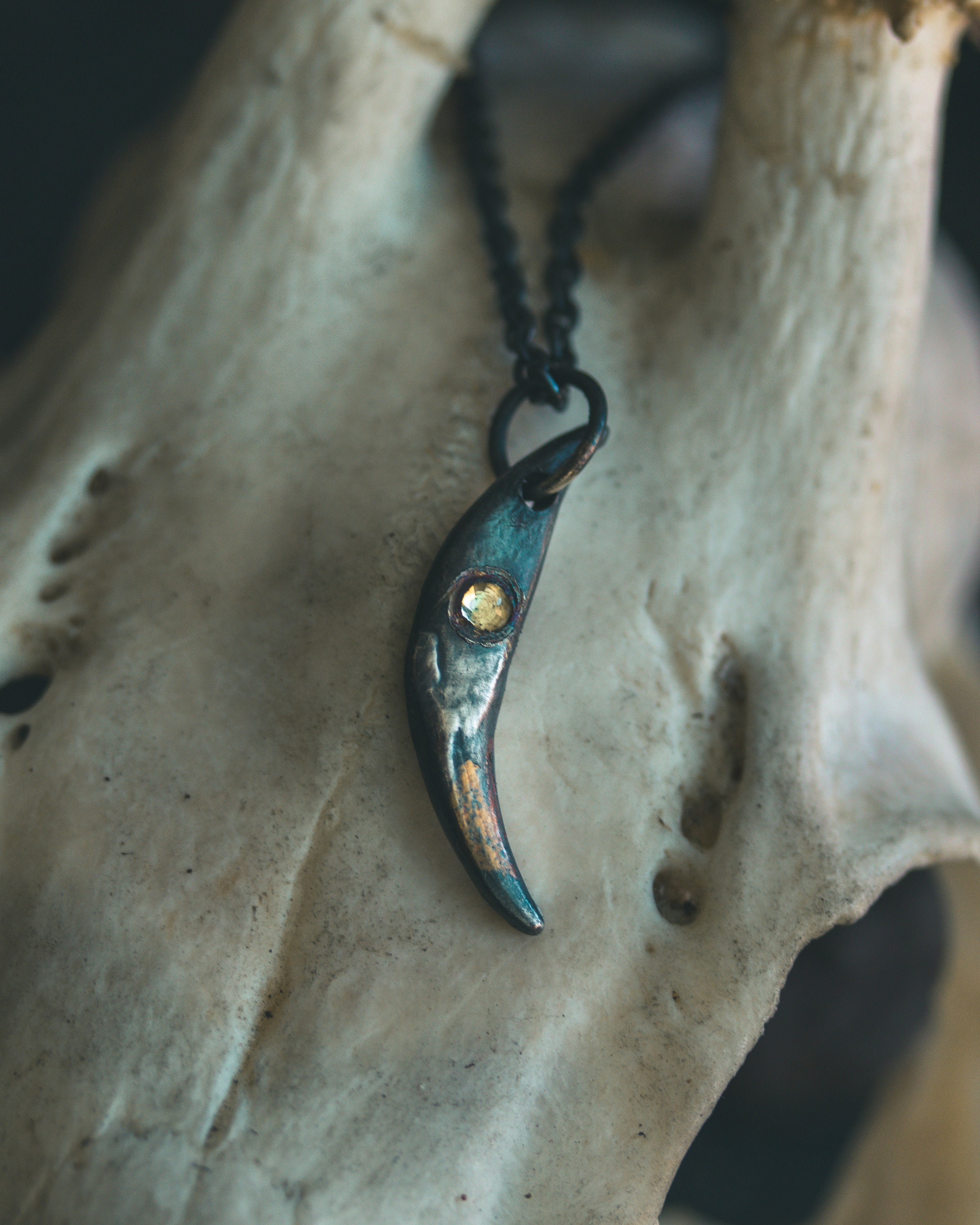 Fox Fang Pendant with Rose-Cut Peridot: A Symbol of Cunning, Growth, and Renewal