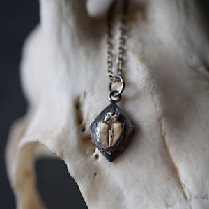 The Stabbed Heart Pendant: An Emblem of Emotional Resilience