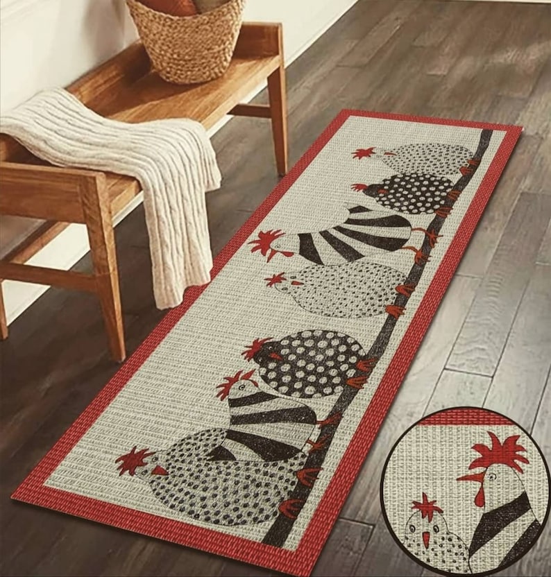 May include: A long, rectangular rug with a red border and a white background. The rug features a black and white design of five chickens lined up in a row. The chickens have different patterns, including stripes and polka dots.