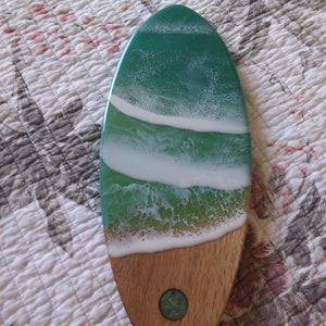 Surfboard resin art