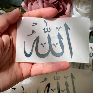 May include: A rustic wooden sign with the text "Welcome to our home" in white lettering. The sign features a distressed finish and a simple, inviting design, perfect for a front porch or entryway.