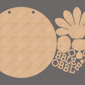 May include: A wooden craft kit for making a "Boggle" game. The kit includes a round wooden base, a flower-shaped piece, and letters that spell out "Boggle".