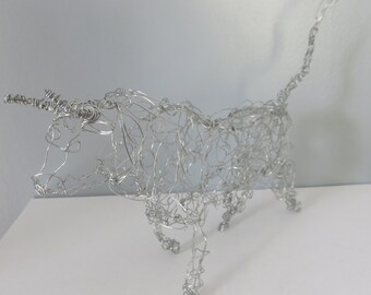 bull sculpture in stainless steel wire,