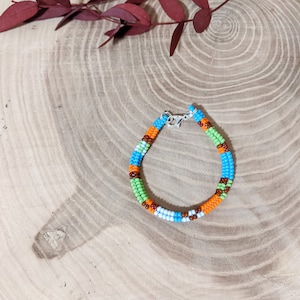 Pulseira multicolorida tecida à mão, Pulseira de miçangas