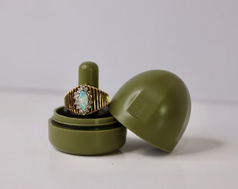 The Ring Thing–Olive Green. Portable ring holder, ring box, jewelry holder - keep rings safe at gym salon beach & traveling. Waterproof.