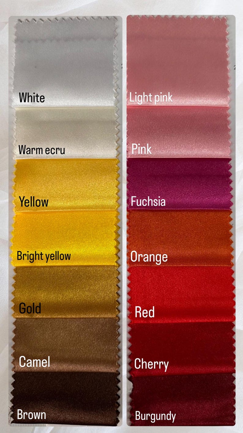 May include: A color swatch image featuring samples of fabric in various colors. The left side displays shades like white, warm ecru, yellow, bright yellow, gold, camel, and brown. The right side shows light pink, pink, fuchsia, orange, red, cherry, and burgundy.