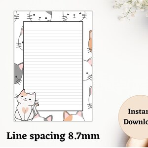 May include: Printable lined paper with a cute cat theme. The paper has a white background with black and pink cat faces and a single cat sitting down. The paper has a lined area for writing with a line spacing of 8.7 mm. The text "Instant Download" is visible in the lower right corner.