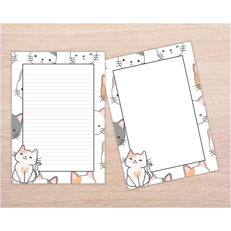 May include: Two white sheets of paper with a border of cartoon cats. The cats are in various colors, including gray, white, orange, and pink. The paper on the left has lined writing space. The paper on the right is blank.