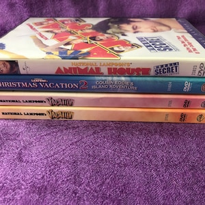 Choose a Movie on DVD, Gently Used, National Lampoon’s Animal House, Christmas Vacation 2, Vacation,