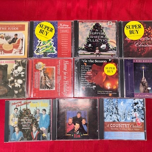 Lote de CDs navideños, 20 CDs de música navideña, en muy buen estado o precintados.
