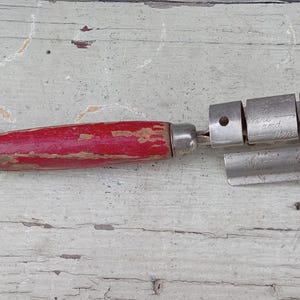 Vintage red handle knife sharpener/ Vintage utensil image 1
