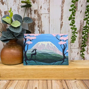 Carte de voeux hiver montagne, carte d'art paysage fantastique, carte d'anniversaire cerf