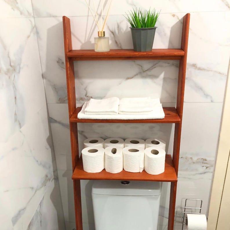 🚽 Over the Toilet Ladder Shelf – Small Space Bathroom Storage Organizer

Make the most of your bathroom with this stylish over toilet shelf, designed specifically for small space storage. This elegant toilet ladder shelf leans securely above your WC, offering vertical bathroom storage without drilling or wall damage — perfect for apartments and modern homes.
