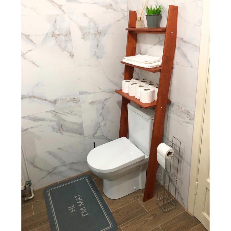 🚽 Over the Toilet Ladder Shelf – Small Space Bathroom Storage Organizer

Make the most of your bathroom with this stylish over toilet shelf, designed specifically for small space storage. This elegant toilet ladder shelf leans securely above your WC, offering vertical bathroom storage without drilling or wall damage — perfect for apartments and modern homes.