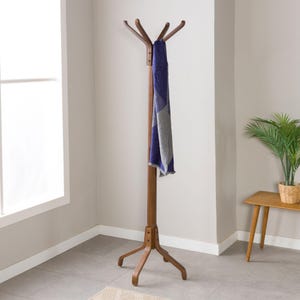 We combine wooden hat rack stand and entryway coat rack stand  as a spacesave furniture. Here is cloth standing coat hanger stand for your home! Coat rack standing and hanging clothes rack was beautifully design and perfect piece of wooden art made with love. If you re looking for wooden cloth stand and freestanding rack, here is the coat rack stand and hallway rack storage.