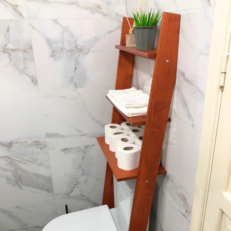 🚽 Over the Toilet Ladder Shelf – Small Space Bathroom Storage Organizer

Make the most of your bathroom with this stylish over toilet shelf, designed specifically for small space storage. This elegant toilet ladder shelf leans securely above your WC, offering vertical bathroom storage without drilling or wall damage — perfect for apartments and modern homes.