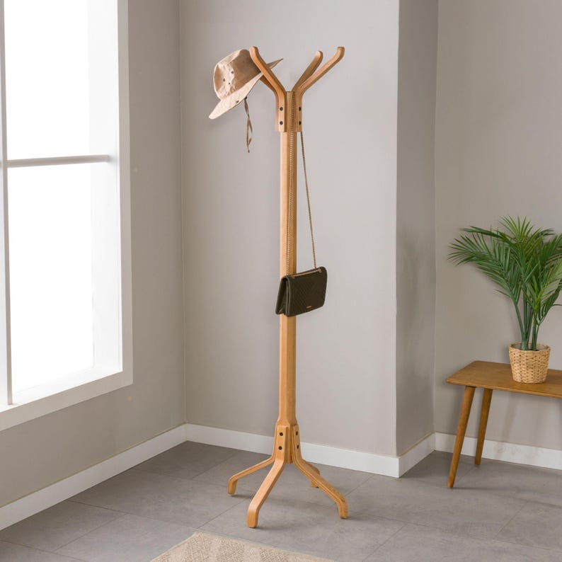 We combine wooden hat rack stand and entryway coat rack stand  as a spacesave furniture. Here is cloth standing coat hanger stand for your home! Coat rack standing and hanging clothes rack was beautifully design and perfect piece of wooden art made with love. If you re looking for wooden cloth stand and freestanding rack, here is the coat rack stand and hallway rack storage.