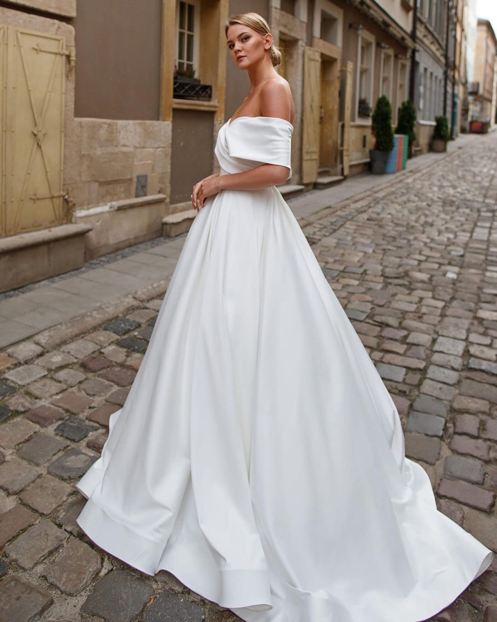 Minimalist White A-Line Bridal Gown with Clean Satin Fabric and Chic Design