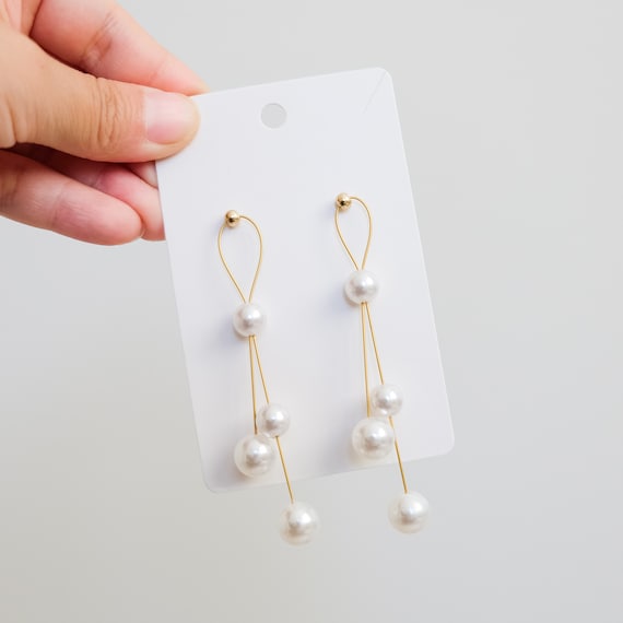 String pearl deals earrings