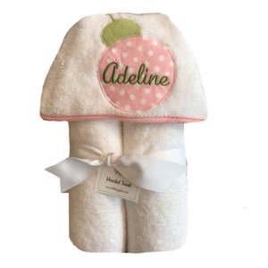 Hooded towel with light pink ladybug