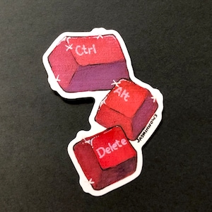 Könnte beinhalten: Drei rote Computertasten mit weißer Beschriftung. Die Tasten sind für "Strg", "Alt" und "Entf".