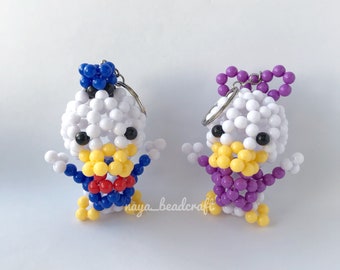 Chaveiro com miçangas Pato Donald ou Margarida