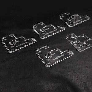 May include: Four clear plastic templates for leather crafting. The templates feature different shapes and sizes of circles, with measurements in millimeters. The text on the templates reads "4mm Stitching 30-08".