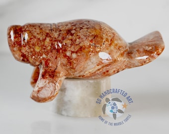 Marty the Marble Manatee on base