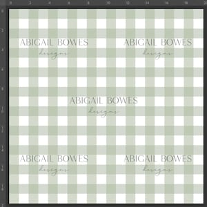 May include: A white and green gingham pattern with the text "ABIGAIL BOWES designs" repeated four times.