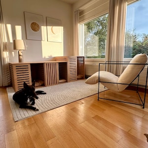 Midcentury modern dog house, plywood dog house, indoor dog house, stylish dog house, minimalist pet furniture, contemporary pet furniture, dog house for modern homes, unique dog house, luxury dog house, modern pet house, indoor pet house,